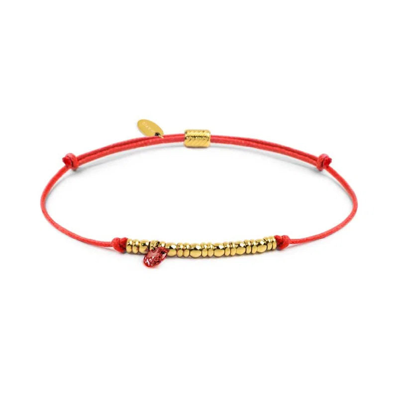 Bracciale cordino con elementi acciaio e zircone pendente