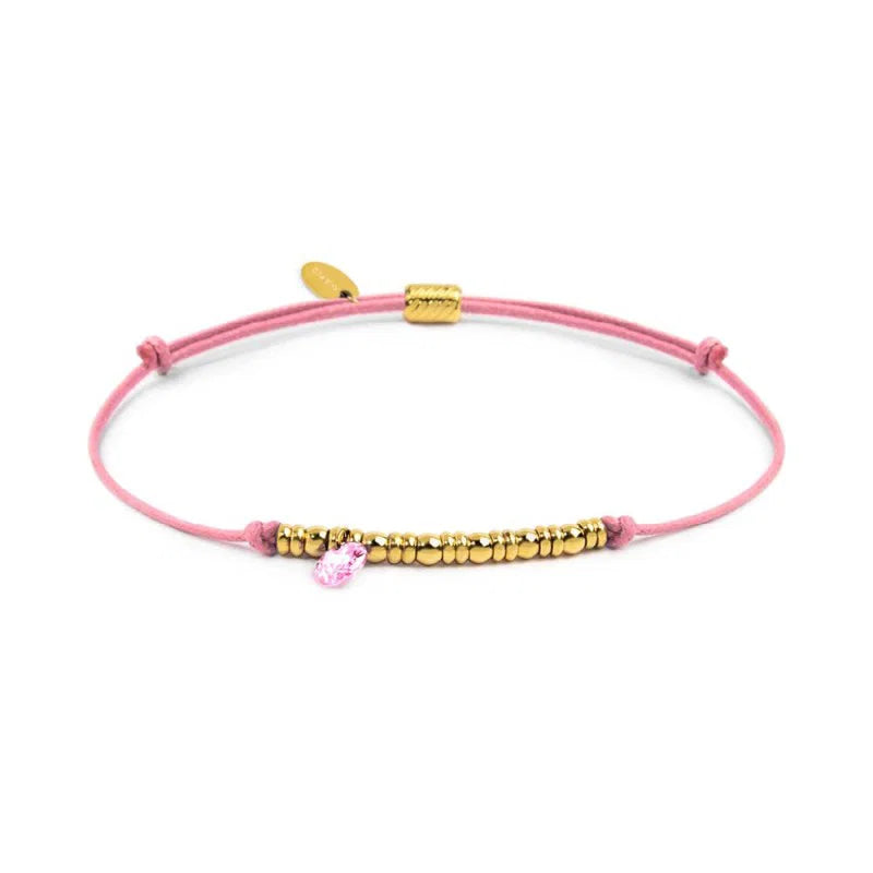 Bracciale cordino con elementi acciaio e zircone pendente