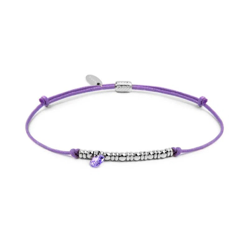 Bracciale cordino con elementi acciaio e zircone pendente
