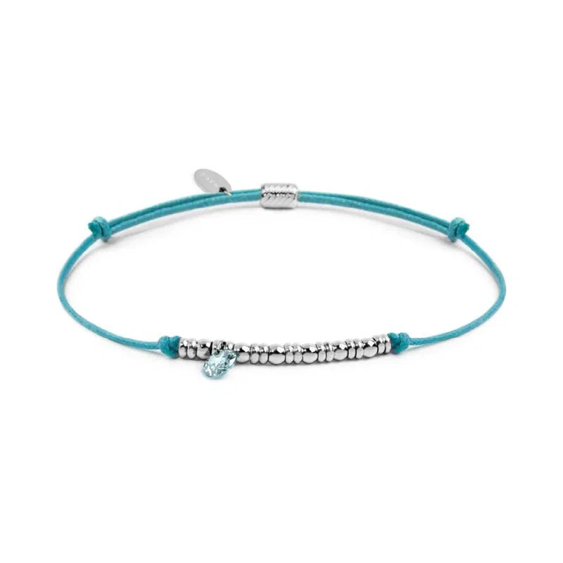 Bracciale cordino con elementi acciaio e zircone pendente