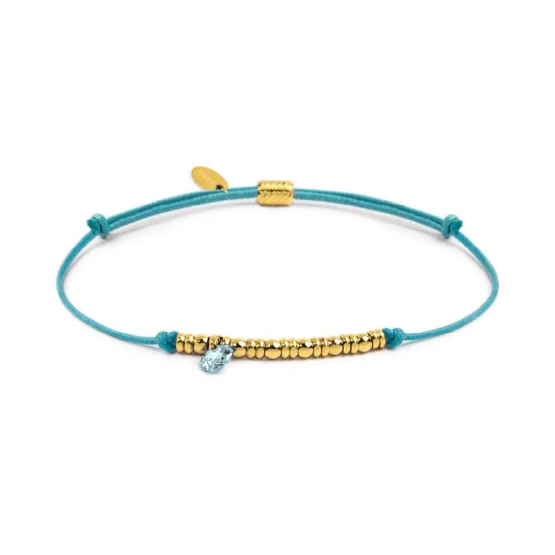 Bracciale cordino con elementi acciaio e zircone pendente