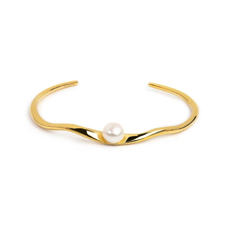 Bracciale rigido a forma organica con perla
