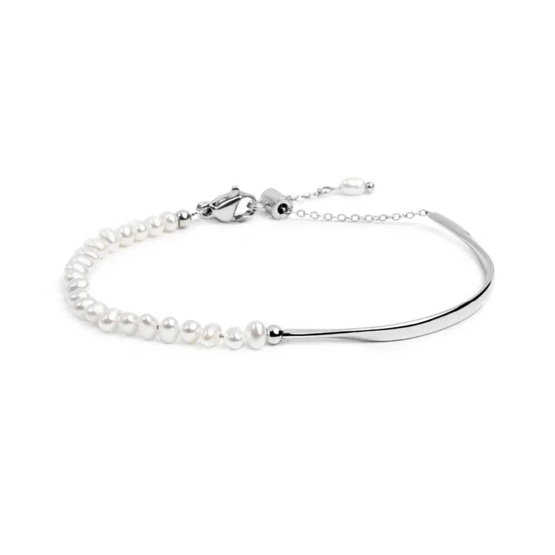 Bracciale semi rigido con tubolare twisted e catena con perle