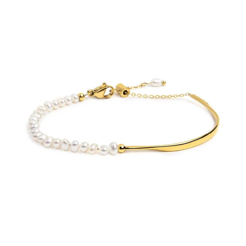 Bracciale semi rigido con tubolare twisted e catena con perle